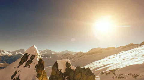 Snowcapped mountains. aerial view. fly over. sunset Video stock 37006563