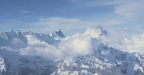 Snowcapped Mountainscape With Clouds 2 Stock Footage 78074636