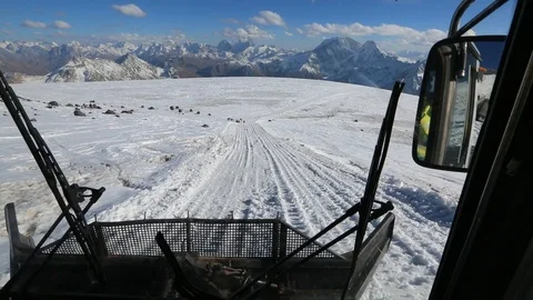 A snowcat down the mount Elbrus Stock Footage 102254294