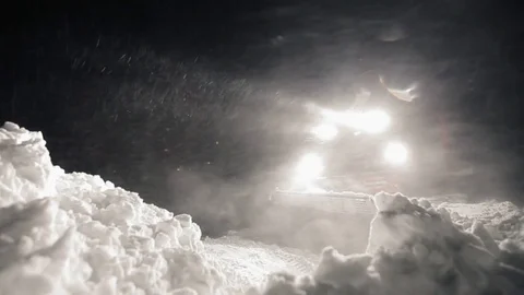 Snowcat preparing a slope at night in high mountains at skiing resort Video stock 76150725