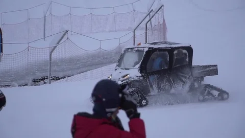 Snowcat, ratrac tractor machine for snow removal and skislope preparation. Stock Footage 84789155