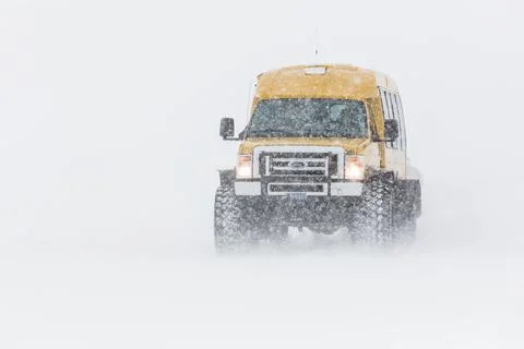 Snowcoach in a blizzard Stock Photos