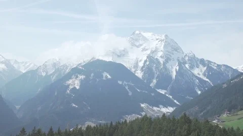 Snowcovered mountains and valley Stock Footage 80333278