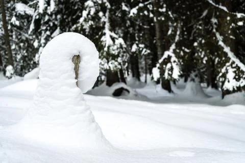Snowdrift on a post Stock Photos
