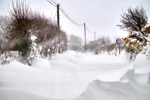Snowdrift on the road Stock Photos