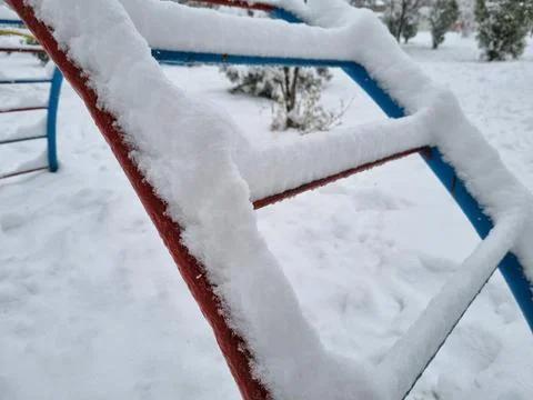 Snowdrifts on the playground Stock Photos