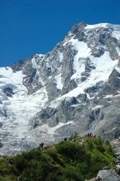 Snowed mountain peak Stock Photos