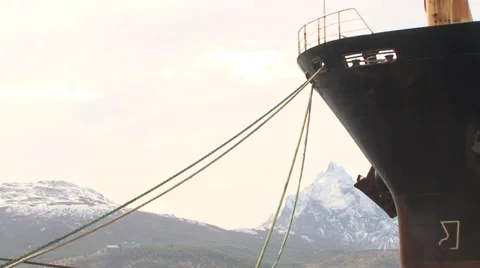Snowed Mountains with Big Cargo Ship. Ushuaia Port, Argentina Video stock 45838367