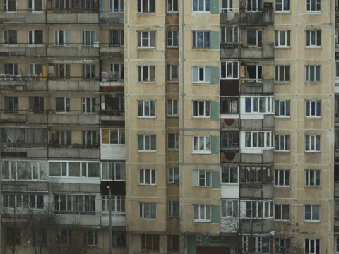 Snowfall against apartment block Stock Footage 76254734