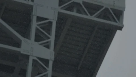 Snowfall against back of stadium stands Stock Footage 105423785