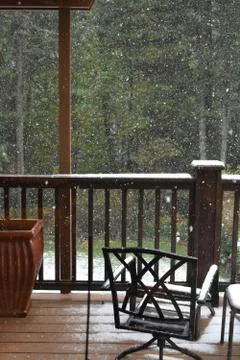 Snowfall on a Balcony Stock Photos