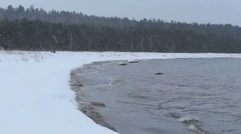 Snowfall in a bay Stock Footage 10574775
