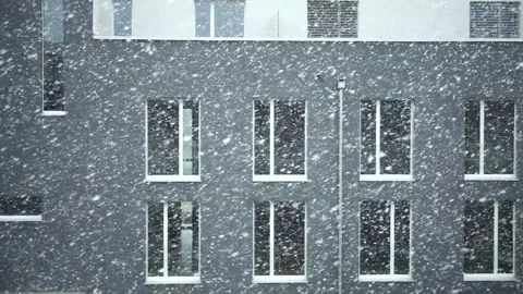 Snowfall Begins in Front of Historic Building Stock Footage 310429804
