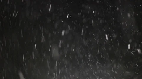 Snowfall on black background Stock Footage 102863045