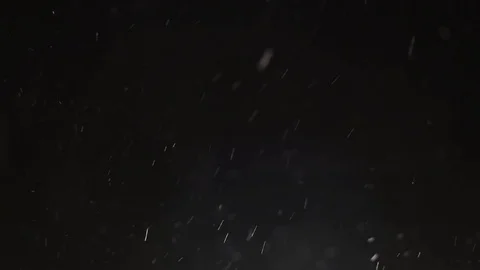 Snowfall on black background Stock Footage 102863115