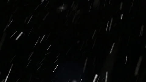 Snowfall on black background Stock Footage 102863239