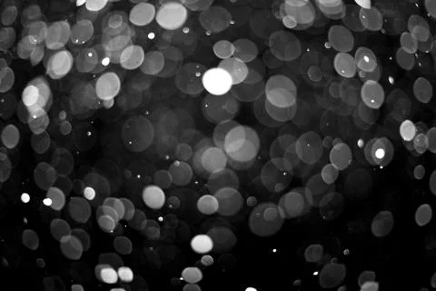 Snowfall on black background Stock Photos