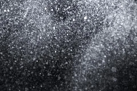 Snowfall on black background Stock Photos