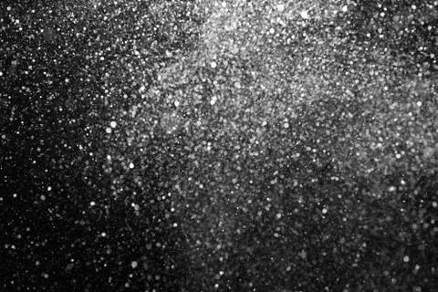 Snowfall on black background Stock Photos