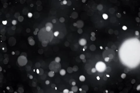 Snowfall on black background Stock Photos