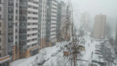 Snowfall blizzard in the city Stock Footage 175994980
