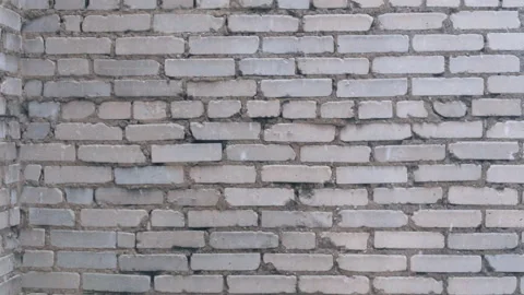 Snowfall on the brick wall background. Snowfalling concept Video stock 87251274