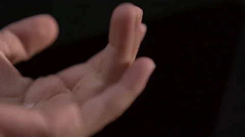 Snowfall on child's hand, Slow Motion Stock Footage 25389491