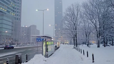 Snowfall in a city center Stock Footage 149081308