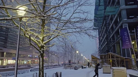 Snowfall in a city center Stock Footage 149153333