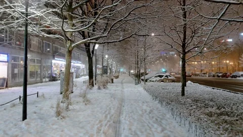 Snowfall in a city center Video stock 149153347