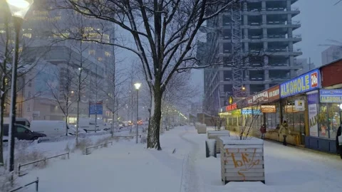 Snowfall in a city center Stock Footage 149153377