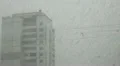 Snowfall in city HD Footage