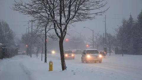 Snowfall in the city Stock Footage 84492607