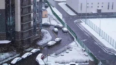 Snowfall in the city Video stock 146002648