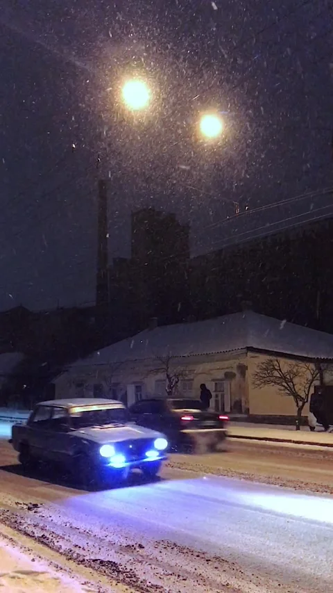 Snowfall in the city Stock Footage 169859685