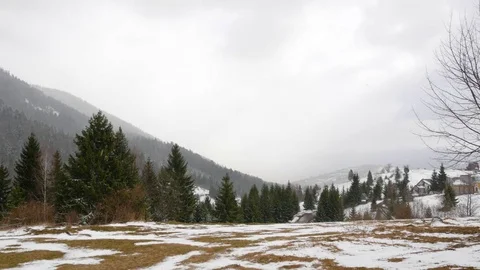Snowfall early spring in the mountains. Stock Footage 74749725