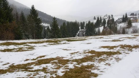 Snowfall early spring in the mountains. Stock Footage 74848409