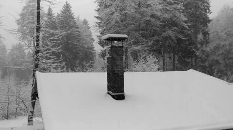 Snowfall in the forest and chimney Stock Footage 46701566