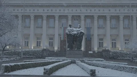 Snowfall in front of a monument to two brothers Cyril and Methodius in the Sofia Stock Footage 328317118