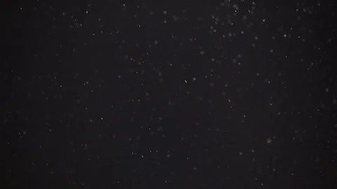 Snowfall in night sky . Stockbeeldmateriaal 122633787