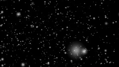Snowfall in a Night Sky with Gentle White Dots Across Black Background. Stock Footage 330392438