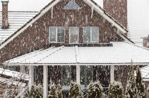 Snowfall outside the window Stock Photos