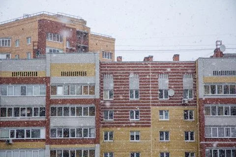 Snowfall over a city Stock Photos