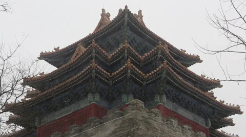 Snowfall over Forbidden City's tower Stock Footage 34860075