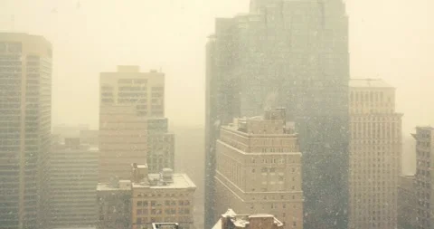 Snowfall Over Modern Cityscape Viewed From Office Window 스톡 동영상 323681370