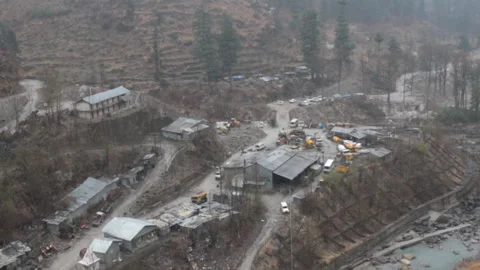 Snowfall over mountain village Stock Footage 89407043
