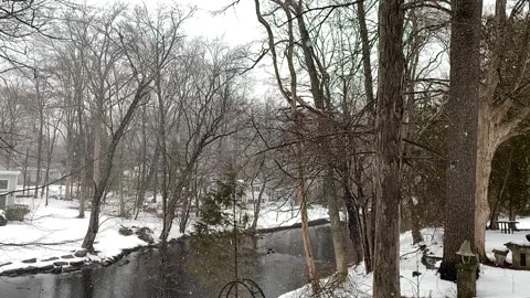 Snowfall over a small rural forest River in Connecticut during Winter Stock Footage 150832001