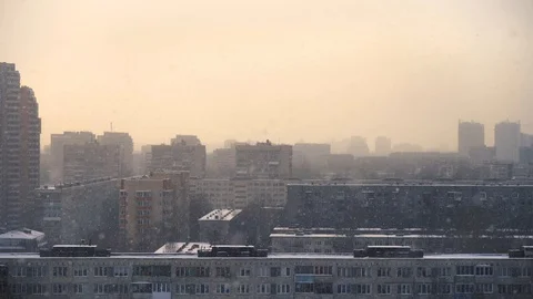 Snowfall over the urban area Stock Footage 86214011