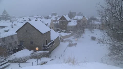 Snowfall Over Visby Old Town From Hilltop Viewpoint, Gotland, Sweden Stock Footage 328587637