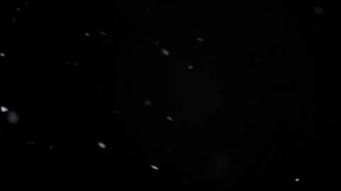 Snowfall overlay against black backdrop Stock Footage 307711741
